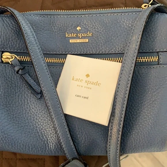 Kate Spade small crossbody bag, a beautiful blue color, used- in good condition. - Picture 4 of 9